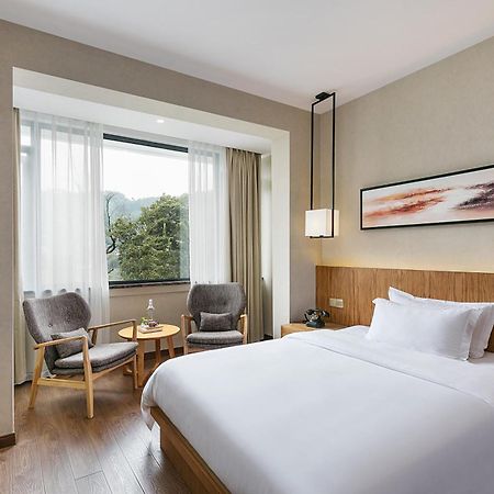 Hangzhou Puyu Travelling With Hotel Eksteriør billede