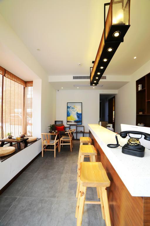 Hangzhou Puyu Travelling With Hotel Eksteriør billede