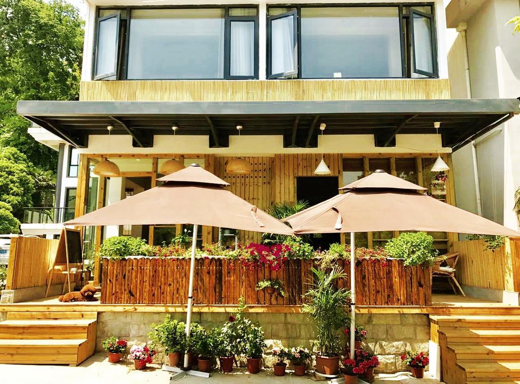 Hangzhou Puyu Travelling With Hotel Eksteriør billede