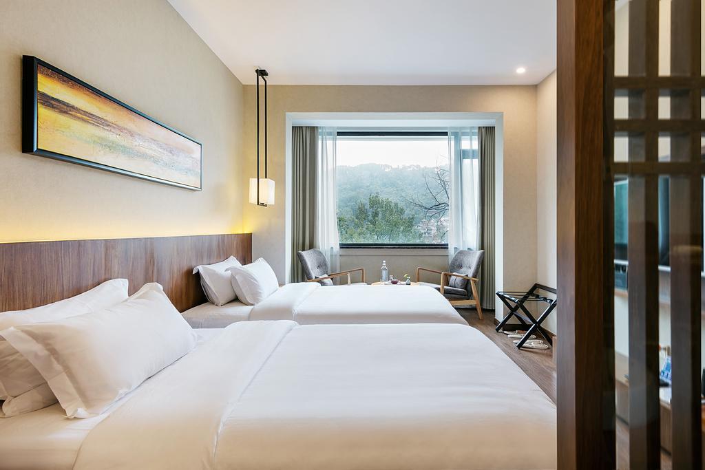 Hangzhou Puyu Travelling With Hotel Eksteriør billede